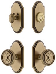 Grandeur Arc Entry Door Set, Keyed Alike with Soleil Knobs in Antique Brass.